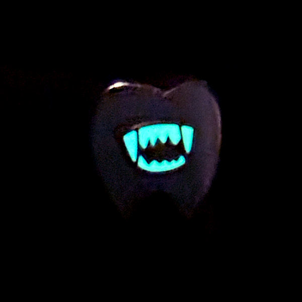 Glow-in-the-dark vampire teeth
